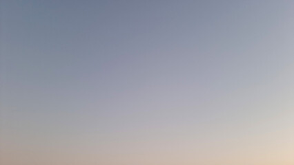 Minimal gradient sky with soft pastel tones at sunset. Natural background with copy space. 