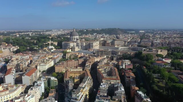 Aerial view captures St. Peter&rsquo;s Basilica, its majestic dome, and the vast Piazza San Pietro, symbolizing the heart of the Catholic Church and Rome&rsquo;s timeless beauty.
