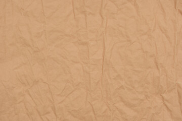 Fototapeta premium Beige Crumpled Kraft Paper Texture Background