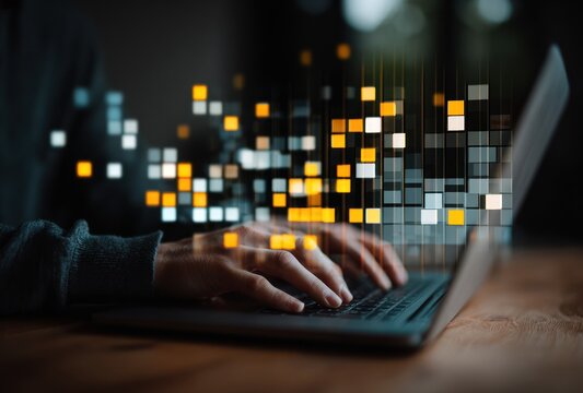 Hands type on a laptop, surrounded by abstract glowing squares on a dark blurred background with a wooden texture below, creating a digital, futuristic scene - Powered by Adobe