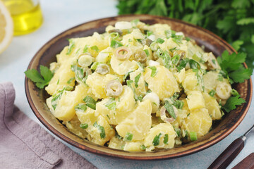 A bowl with Greek potato salads	