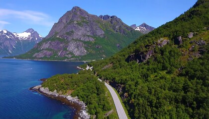 Scenic coastal road winding through mountains