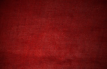 Rustikaler Jutesack Hintergrund mit roter Farbe