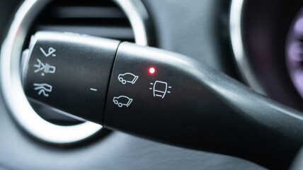 Car light control stalk switch detail for headlight adjustment and fog light operation system feature