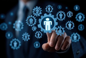 A hand selects a glowing, stylized person figure within a gear. Other gears with person icons float in the background, creating a tech network feel