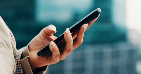 Cellphone, hands and businesswoman in city with networking, communication or connectivity online....