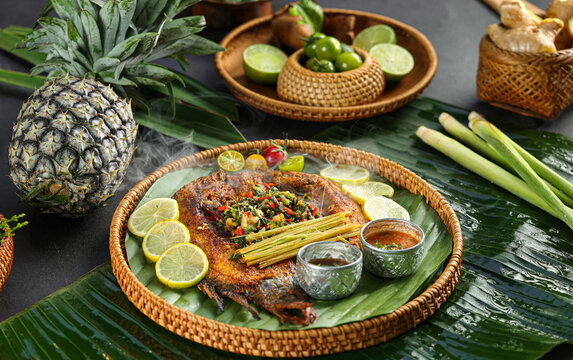 Fried fish with lemon and pineapple flavors,the Dai nationality cuisine,from Xishuangbanna,Yunnan,China