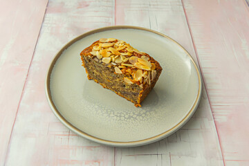 Almond cake with a moist and dense texture, made with quality ground almonds and decorated with toasted almond flakes