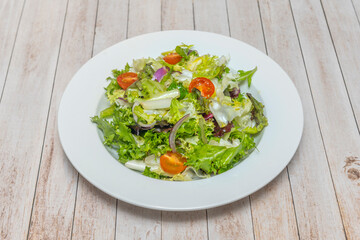  salad with canned tuna, spring onion, red pepper, and boiled egg, with an apple cider vinegar and parsley dressing.