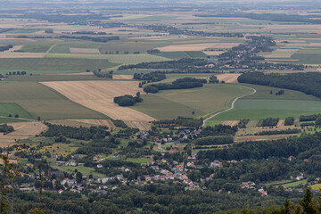 Naklejka premium Opawskie Mountains, Poland. View from the summit to the mountain valley of the Czech Republic and Poland.