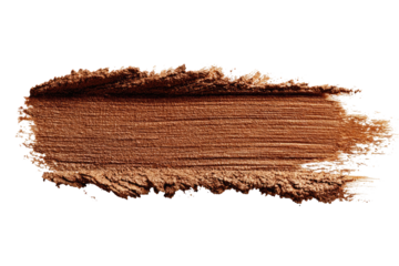 Close-up of a textured, bronze-toned powder swatch.  Brushstrokes are visible