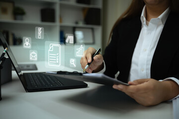 Concept of digital workflow with file management icons overlayed on a laptop screen
