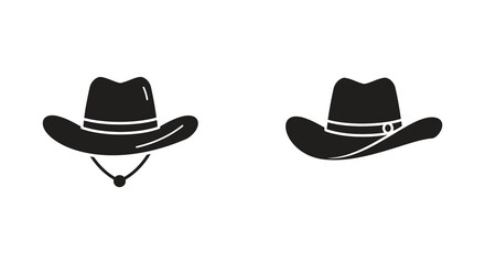 two black cowboy hats hanging side by side