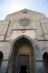 Santa Clara (St. Clare) church, religious complex with monastery, tombs and museum, Naples, Italy.
Façade in Gotico Angioiano style of the basilica (1313–1340) partially destroyed during World War II.