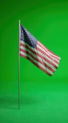 Obraz premium USA stars and stripes flag on green screen backdrop ideal for political campaign videos and American themed multimedia content creation 