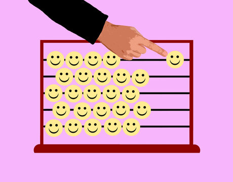 Hand counting smiley faces on abacus symbolizing happiness and wellbeing