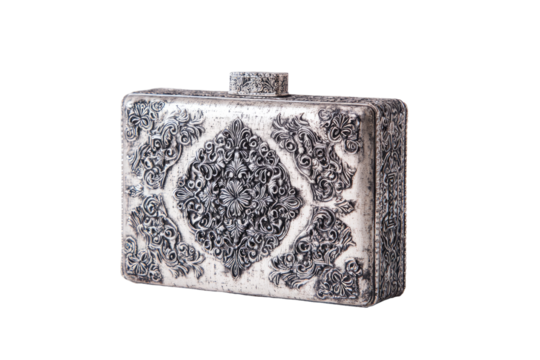 Ornate, rectangular clutch with detailed, embossed floral designs