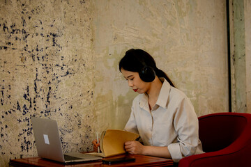 Professional businesswoman working at office desk with laptop, analyzing financial data, showcasing leadership, motivation, corporate expertise, and entrepreneurial confidence.