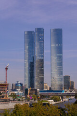 Fototapeta premium High-rise buildings and skyscrapers on a sunny summer day.