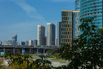 Fototapeta premium High-rise buildings and skyscrapers on a sunny summer day.