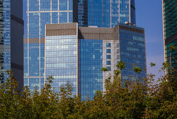 High-rise buildings and skyscrapers on a sunny summer day.