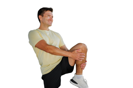 Man in athletic wear performing leg stretch to enhance flexibility and prevent injury during workout session