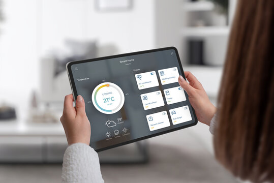 Modern smart home control displayed on tablet screen with connected devices