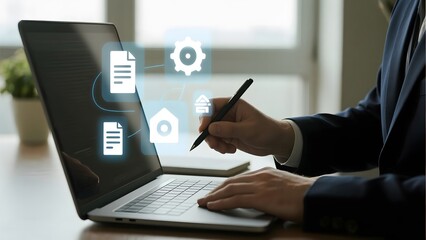 Businessman interacting with digital icons on a laptop screen