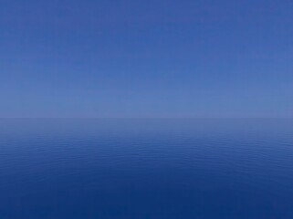 Obraz premium Calm, vast expanse of deep blue ocean meeting a pale blue sky