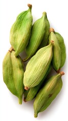 Pile Of Green Cardamom Pods On White Background
