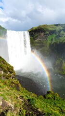 Majestic waterfall with rainbow