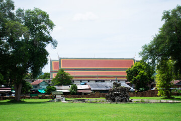 Ancient old ordination hall and ruin ubosot for thai people traveler travel visit respect pray blessing antique holy buddha at Wat Tai or Chai Chumphon Chana Songkhram Temple in Kanchanaburi, Thailand