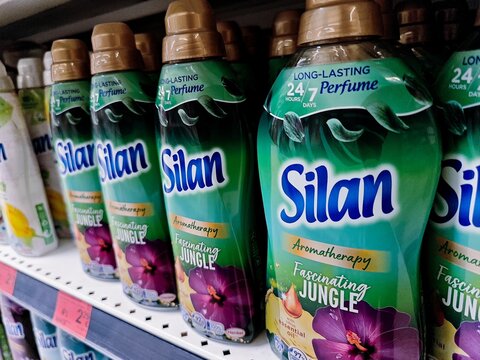 Bottles of Silan fabric softener Fascinating Jungle aroma on store shelf