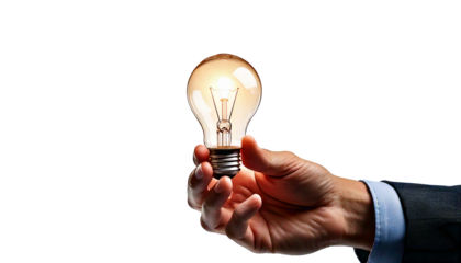 A businessman holding a glowing light bulb, symbolizing a new idea or innovation, isolated