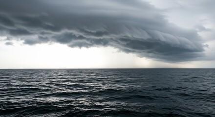 Dark ominous clouds dramatically loom over a restless ocean under a muted light. AI Generated