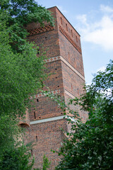 14th century red brick Leaning Tower, located in Medieval Town of Torun, Torun, Poland