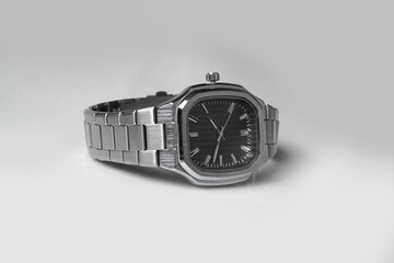 Men's silver watch with a square shape and stainless steel material