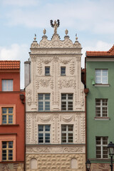 Baroque Tenement Caesar Arch, 18th century building next to Old Town Market Square, Torun, Poland