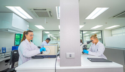 Scientists conducting research in a modern laboratory workspace
