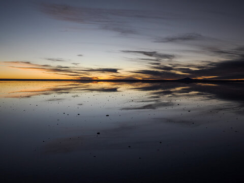 Landscape photography of Salar de Uyuni with mirror effect., sunset.