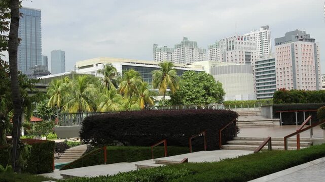 The atmosphere of the swimming pool in a luxury hotel in the city center. 