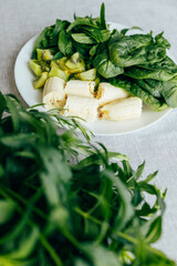 Fresh green smoothie ingredients: spinach, mint, kiwi and banana. Healthy food, recipes, health content	