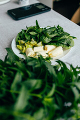 Fresh green smoothie ingredients: spinach, mint, kiwi and banana. Healthy food, recipes, health content	