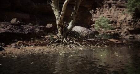 A tranquil riverbank is framed by a majestic tree with sprawling roots, surrounded by stunning rock formations and gentle foliage under a clear blue sky, inviting quiet contemplation in nature.