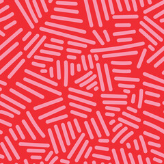 Pink lines on red create a bold seamless pattern with rhythmic flow for textiles or wallpaper