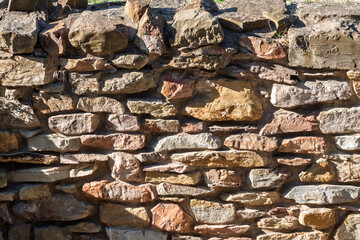 Fototapeta premium Backgrounds of the old stone wall.