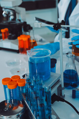 Collaboration, tablet or science with people in lab together for research or development. Innovation, tech and microscope with scientist team in clinical trial for planning or medical investigation