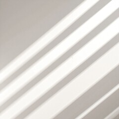 Obraz premium A beautifully crafted ceramic vase filled with vibrant, fresh flowers, including roses and daisies, rests elegantly on a polished wooden floor.