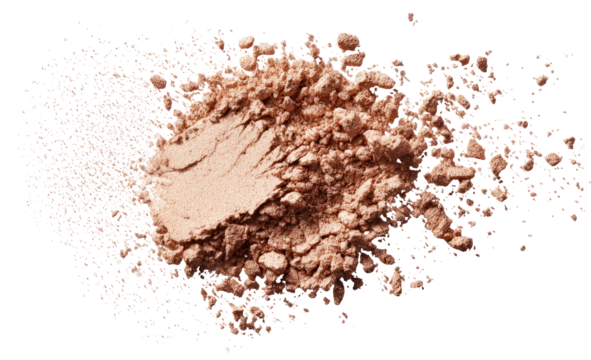 A close-up of loose, light brown powder.  The powder is concentrated in the center, with a lighter, streaky texture, and is surrounded by a cloud of fine particles