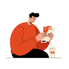 Young man sitting and reviewing unpaid bills with coffee cup  
